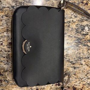 Black Kate Spade crossbody. Good condition.